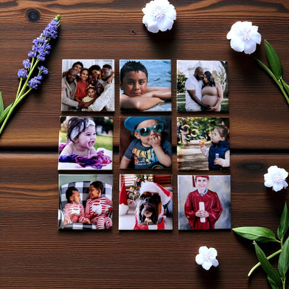 Collection of photo magnets of various images on a wooden surface with flowers
